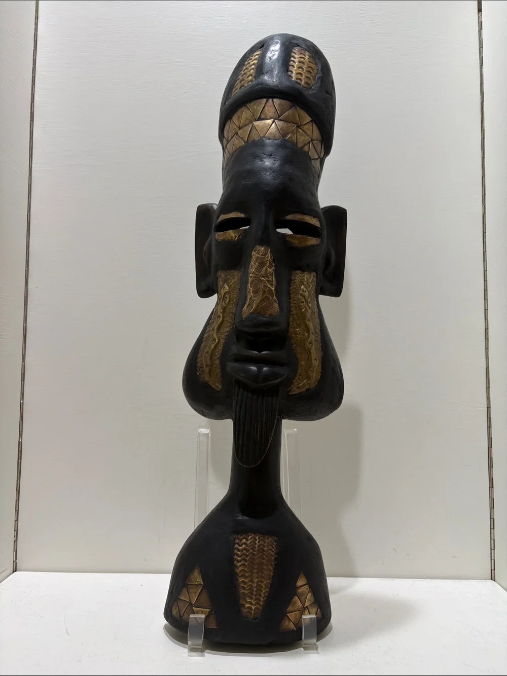 Hand-Carved Black and Brass Tribal Mask from Ghana